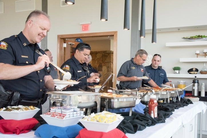 first responders enjoying breakfast at Canyon Falls community