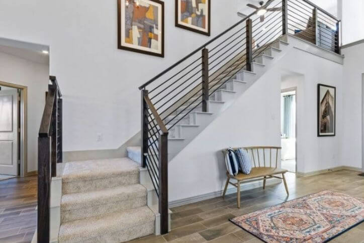 Landon Homes model home staircase at Canyon Falls community